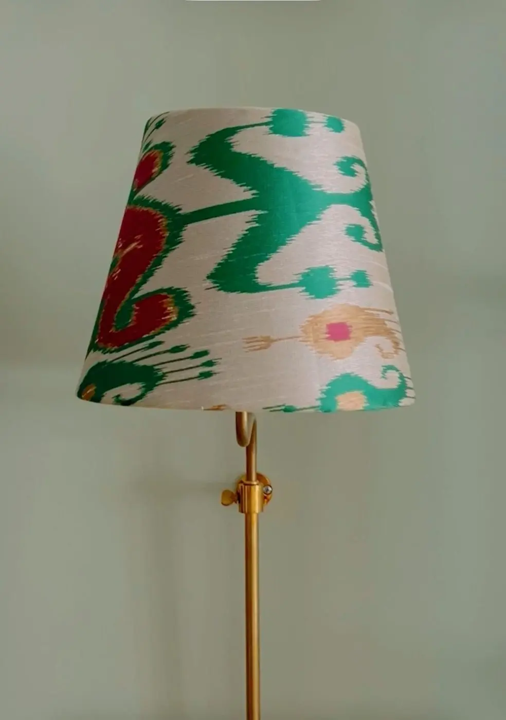Ikat fabric shade on brass floor lamp base by Chancel Studio