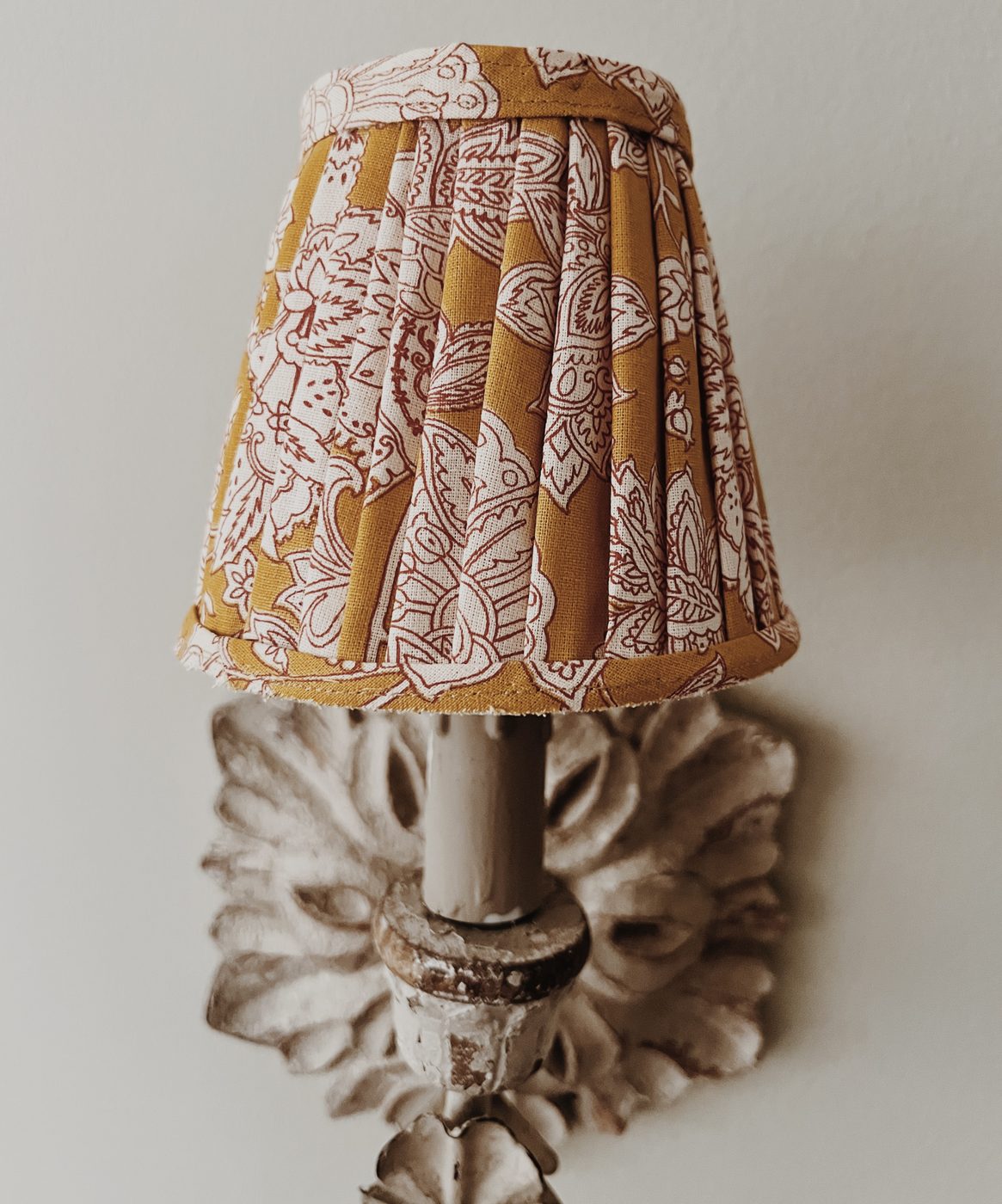 Pleated fabric lampshade on vintage sconce base by Chancel Studio